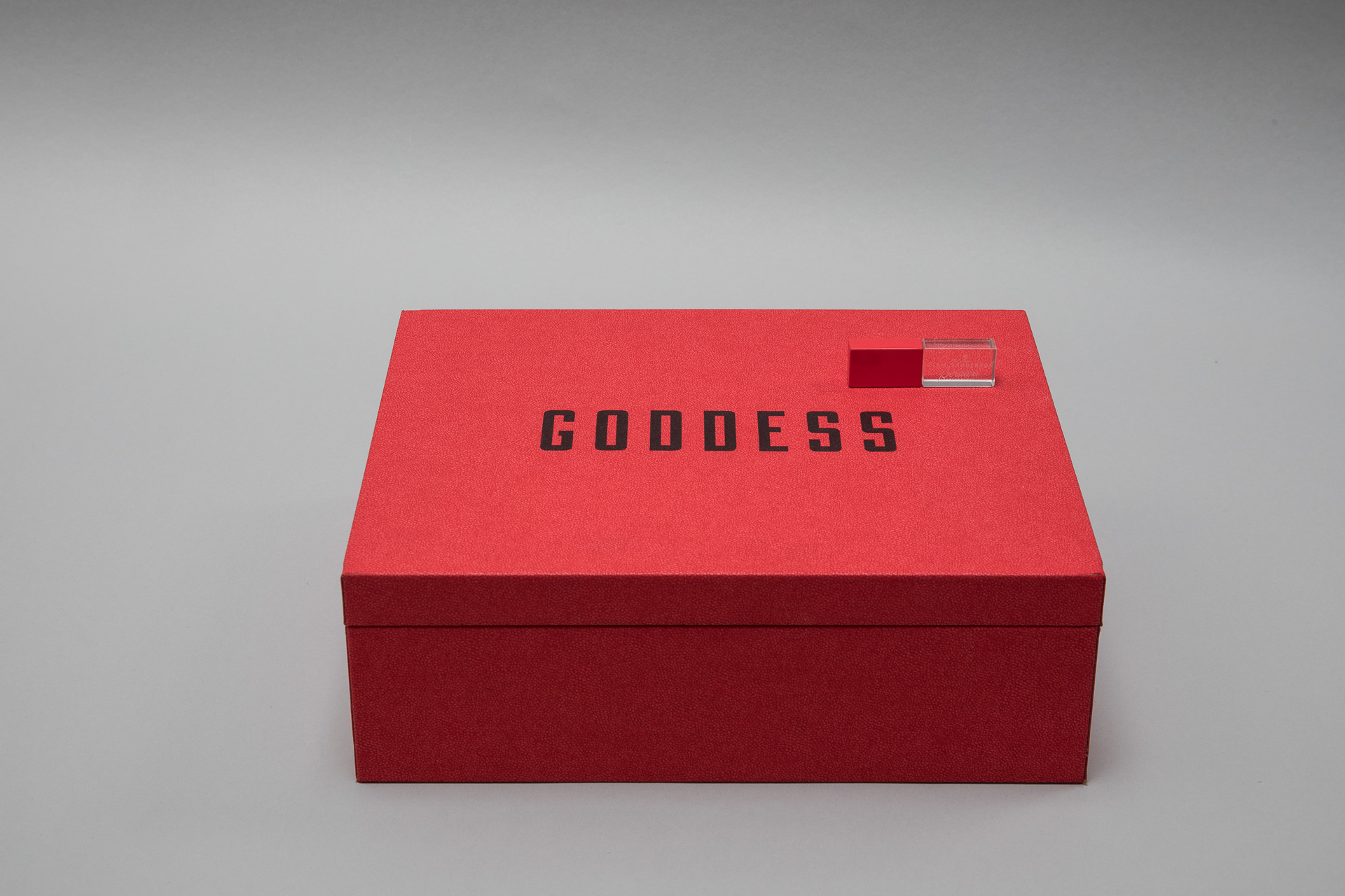 red box with the word GODDESS written on it 